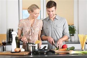 Couple making dinner together